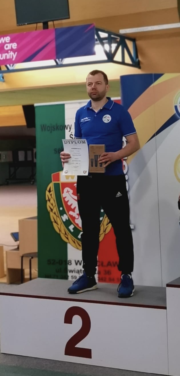 Marcin Szymański na&nbsp;podium